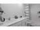 Bathroom featuring double sinks, neutral decor, shower and bath for convenience at 1420 6Th Ne St, Hickory, NC 28601