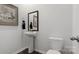 Stylish powder room with modern fixtures, sleek pedestal sink, and contemporary decor at 1420 6Th Ne St, Hickory, NC 28601