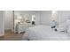 Bedroom with neutral decor, carpet, and a comfortable bed with many throw pillows at 1420 6Th Ne St, Hickory, NC 28601