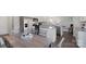 Bright eat-in kitchen with stainless appliances, granite countertops, and an island with bar seating at 1420 6Th Ne St, Hickory, NC 28601
