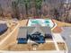 Aerial view of community pool and clubhouse with parking at 168 Kennerly Center Dr, Mooresville, NC 28115