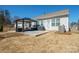 Well-maintained backyard featuring a patio with outdoor seating and a grill, ideal for entertaining at 168 Kennerly Center Dr, Mooresville, NC 28115