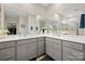 Bathroom features a double vanity and large mirrors at 168 Kennerly Center Dr, Mooresville, NC 28115