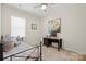 Bedroom with desk space and bed near window for natural light at 168 Kennerly Center Dr, Mooresville, NC 28115