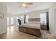 Spacious bedroom with light-colored floors and access to a private balcony at 168 Kennerly Center Dr, Mooresville, NC 28115
