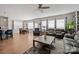 Open-concept floor plan with hardwood floors seamlessly connects the living room, dining area, and kitchen at 168 Kennerly Center Dr, Mooresville, NC 28115