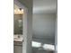 En-suite bathroom with a shower and double sink vanity, offering style and convenience at 1708 Honey Trl, Monroe, NC 28112