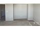 Bright bedroom featuring a niche, ready for personalization in a new home at 1708 Honey Trl, Monroe, NC 28112