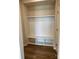Well-organized mudroom with a built-in bench, storage cubbies, and overhead shelf at 1708 Honey Trl, Monroe, NC 28112