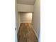 Spacious storage room featuring wood floors, offering ample space for organizing belongings at 1708 Honey Trl, Monroe, NC 28112