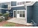 A backyard featuring a door, a bush and an air conditioner at 17537 Tuscany Ln, Cornelius, NC 28031