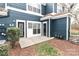 A backyard featuring a door and a bush at 17537 Tuscany Ln, Cornelius, NC 28031