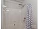 Shower/tub combination with a shower curtain at 17537 Tuscany Ln, Cornelius, NC 28031