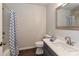 Bathroom features white vanity, a shower/tub combo with a shower curtain at 17537 Tuscany Ln, Cornelius, NC 28031