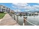 Scenic view of the marina, showcasing numerous boats and a walkway leading to the water at 17537 Tuscany Ln, Cornelius, NC 28031