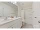 Bright bathroom with double sinks, white cabinets, and a bathtub-shower combo at 181 Atwater Landing Dr, Mooresville, NC 28117