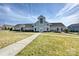 Charming clubhouse exterior with well-manicured lawn and sidewalk, perfect for community events at 181 Atwater Landing Dr, Mooresville, NC 28117