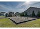 Community playground featuring slides, climbing structures, and swings for enjoyment at 181 Atwater Landing Dr, Mooresville, NC 28117