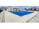 Community pool is closed for the season and covered with a blue tarp for safety at 181 Atwater Landing Dr, Mooresville, NC 28117