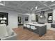 Contemporary kitchen with a spacious island, stainless steel appliances, and elegant lighting at 19110 Newburg Hill Rd, Davidson, NC 28036