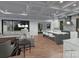 Open-concept living room and kitchen with modern finishes and plenty of natural light at 19110 Newburg Hill Rd, Davidson, NC 28036