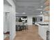 Open-concept living area with modern furnishings, a sleek kitchen, and a bright, airy atmosphere at 19110 Newburg Hill Rd, Davidson, NC 28036