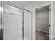 Bathroom featuring a sleek glass shower and a well-organized walk in closet at 200 Lake George Dr, Shelby, NC 28152