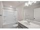 Bathroom featuring a modern vanity with elegant finishes and a shower-tub combo at 200 Lake George Dr, Shelby, NC 28152