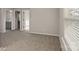 Cozy bedroom with neutral colors, and an ensuite bathroom, bathed in natural light at 200 Lake George Dr, Shelby, NC 28152