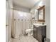 Cozy bathroom featuring a vanity, toilet, mirror and shower with a curtain at 2027 Franklin St, Rock Hill, SC 29732