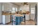 Bright kitchen with white cabinets, a center island, and stainless steel appliances at 2027 Franklin St, Rock Hill, SC 29732