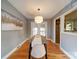 Bright dining room with hardwood floors and view to outdoor deck at 2036 Edgewater Dr, Charlotte, NC 28210