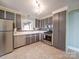 Full kitchen with stainless steel appliances and plenty of storage cabinets at 2036 Edgewater Dr, Charlotte, NC 28210