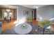 Open floor plan with a view of the living room and dining area with hardwood floors at 2036 Edgewater Dr, Charlotte, NC 28210