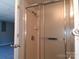 Enclosed shower with textured glass, silver trim and fixtures, and tiled walls, offering a functional design at 2036 Edgewater Dr, Charlotte, NC 28210