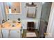 Bathroom with a white vanity and sink, with a towel rack next to the shower stall at 2207 Windsor Woods Dr, Gastonia, NC 28054