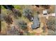 Aerial view of a home with long driveway and surrounded by mature trees at 2509 Wesley Chapel Rd, Indian Trail, NC 28079