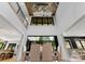 Bright dining room features an eye-catching wooden ceiling and seamless indoor-outdoor transition at 3416 Windsor Dr, Charlotte, NC 28209