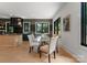 Elegant dining room with modern decor and a unique glass table at 3416 Windsor Dr, Charlotte, NC 28209