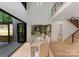 Bright dining room features hardwood floors and an open floor plan, perfect for entertaining at 3416 Windsor Dr, Charlotte, NC 28209