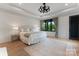 Serene main bedroom featuring soft lighting and a neutral color palette at 3416 Windsor Dr, Charlotte, NC 28209