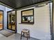 Outdoor patio features pass through window to the kitchen at 3416 Windsor Dr, Charlotte, NC 28209