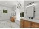 A serene bathroom features shiplap walls, soaking tub, walk-in shower, and double vanities at 406 Morrison Farm Rd, Troutman, NC 28166