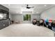 A spacious bonus room is complete with seating and ample space for activities at 406 Morrison Farm Rd, Troutman, NC 28166