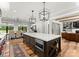 Open kitchen featuring a large island, dining area, and modern finishes throughout at 406 Morrison Farm Rd, Troutman, NC 28166