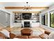 Comfortable living room with hardwood floors, fireplace, built-in shelving and stylish decor at 406 Morrison Farm Rd, Troutman, NC 28166