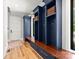 A stylish mudroom features built-in lockers, drawers, and wooden accents at 406 Morrison Farm Rd, Troutman, NC 28166