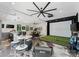 Spacious rec room features a putting green, a wet bar, and an entertainment area at 406 Morrison Farm Rd, Troutman, NC 28166