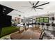 Huge rec room features a table, a simulated putting green, and a bar with seating at 406 Morrison Farm Rd, Troutman, NC 28166