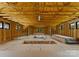 Unfinished room with wood beams and open floor plan, ready for customization at 406 Morrison Farm Rd, Troutman, NC 28166